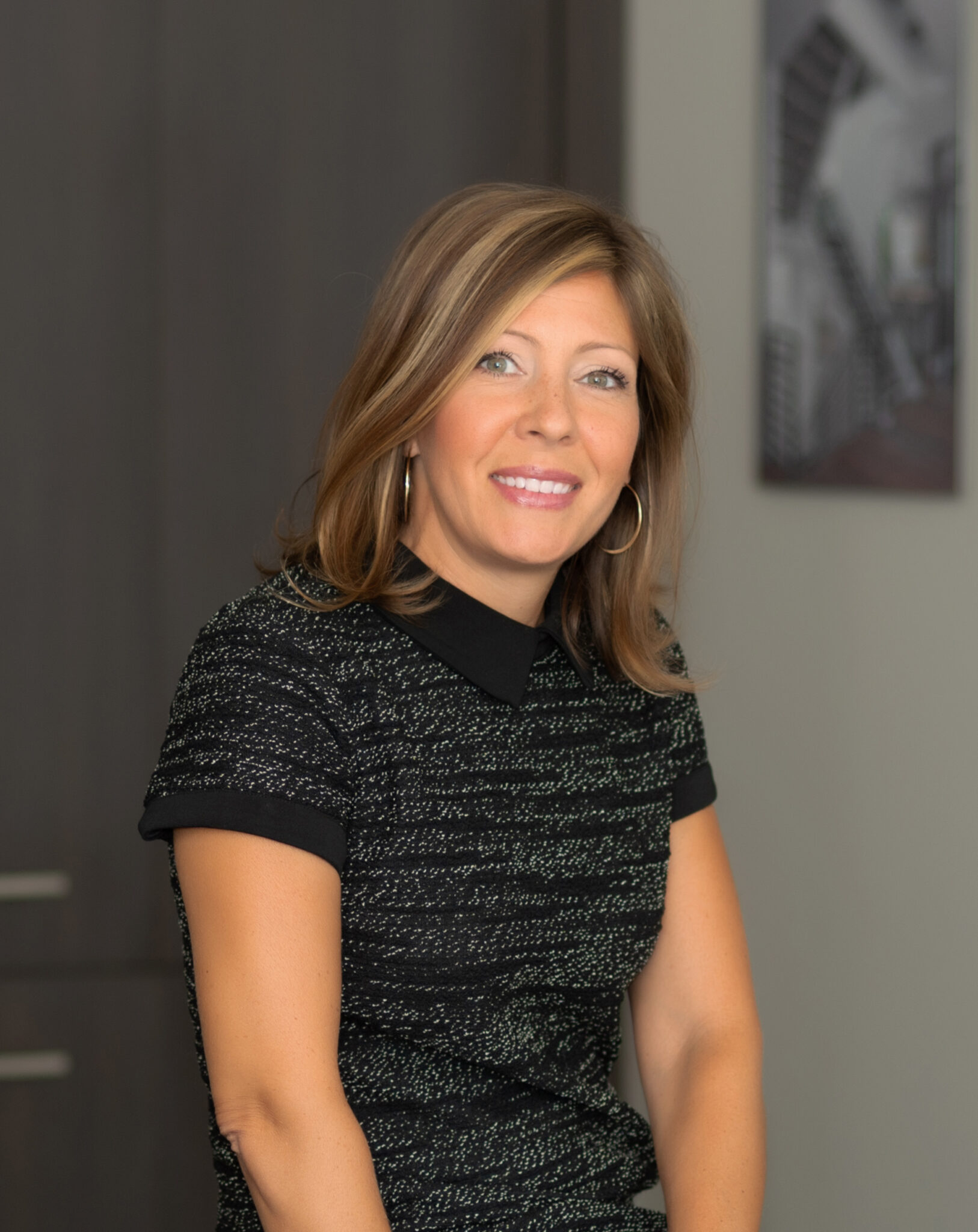 a woman smiling for the camera