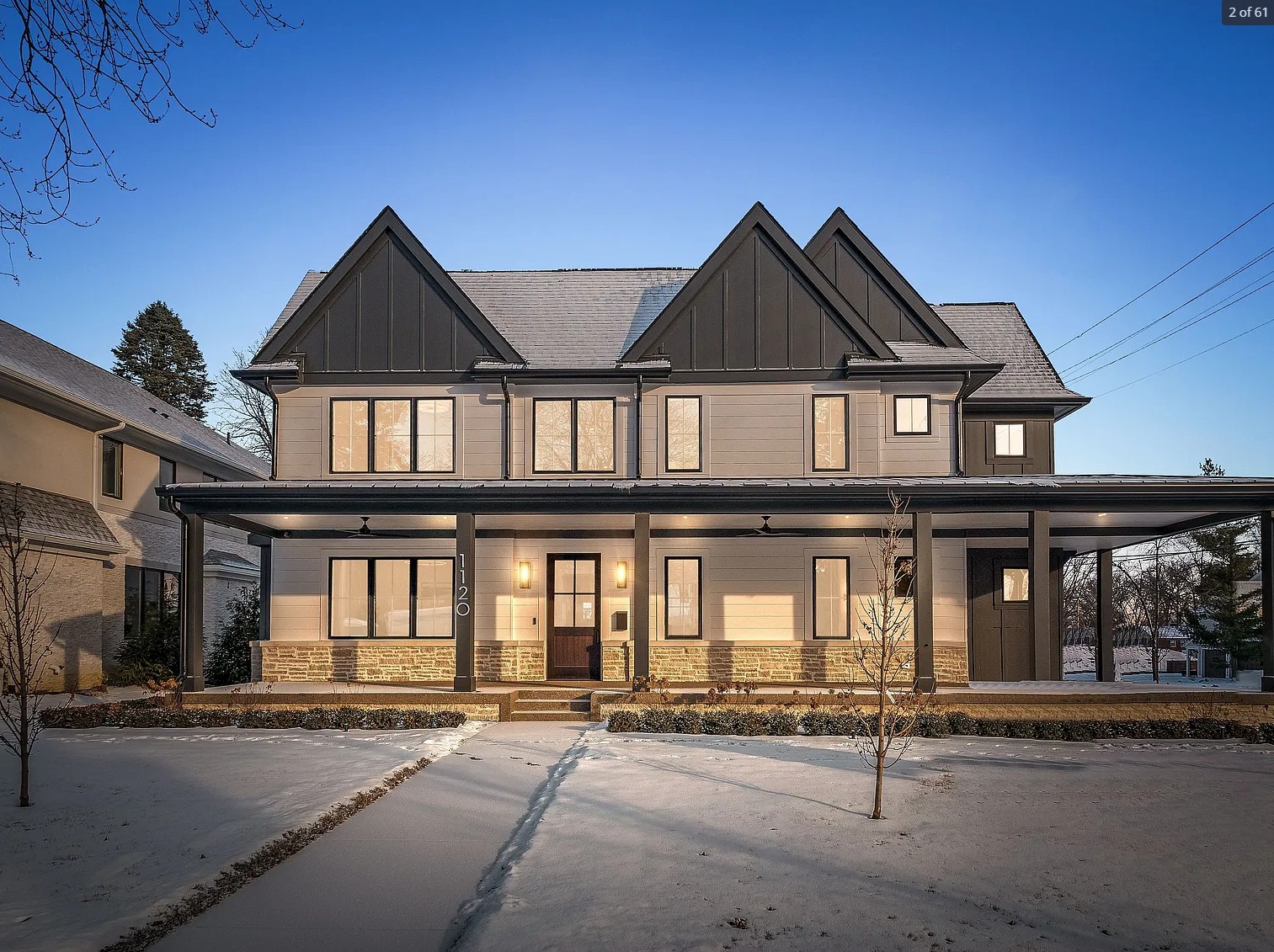 a close up of a street in front of a house with Shakespeare's Birthplace in the background