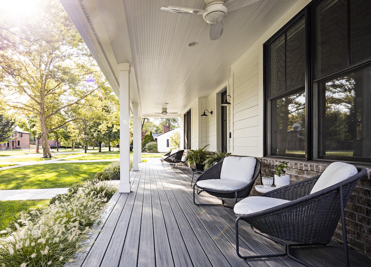 a chair sitting in front of a building