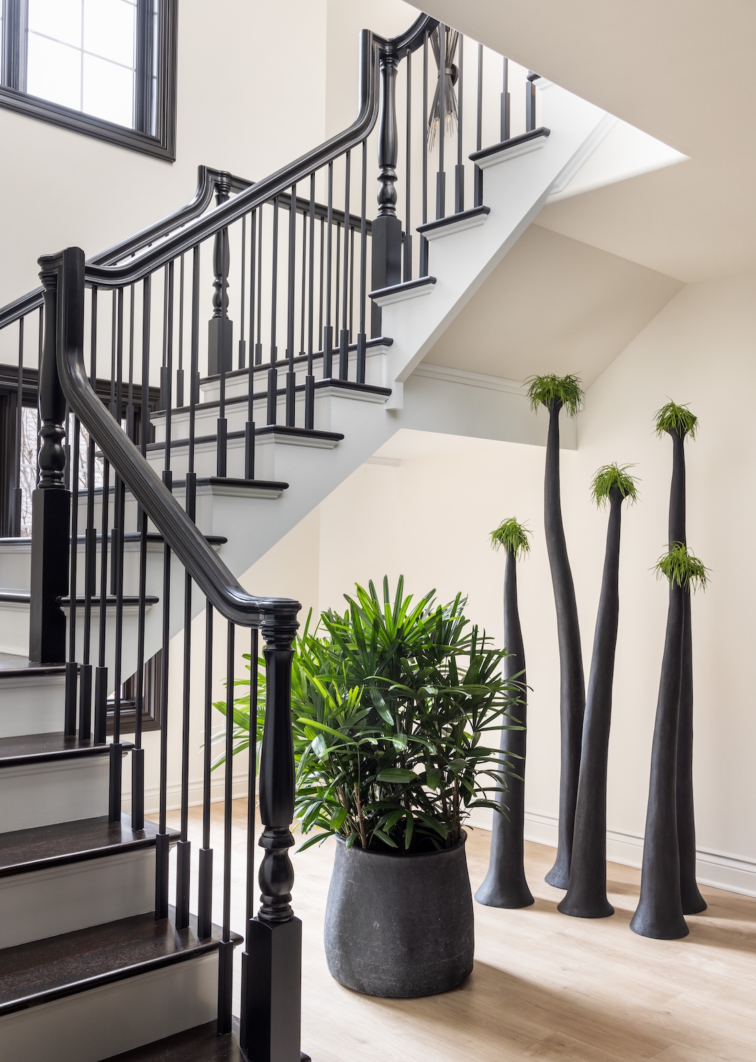 a room filled with furniture next to a building