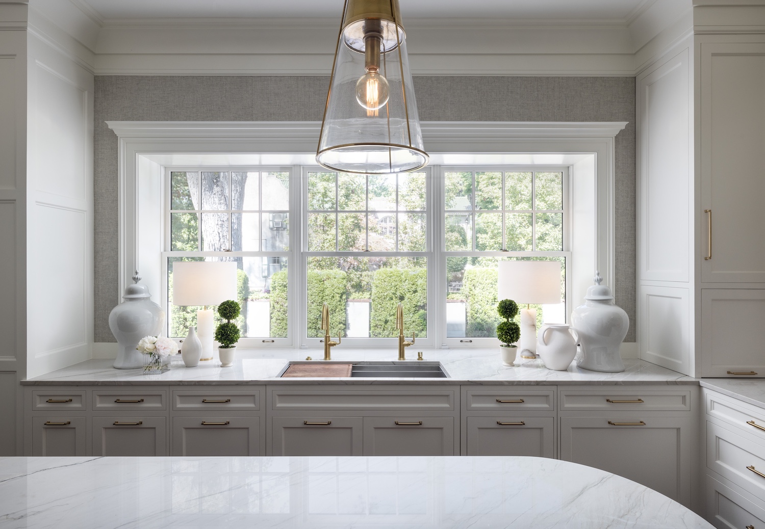 a kitchen with a sink and a window