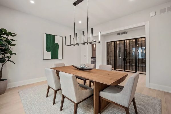 a room filled with furniture and a large window