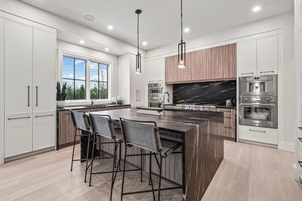 a kitchen with a dining room table