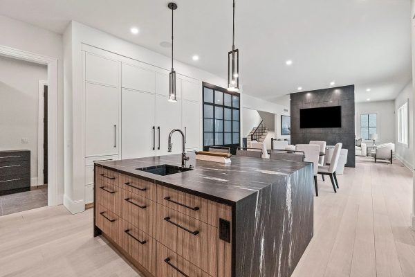 a kitchen with a table in a room