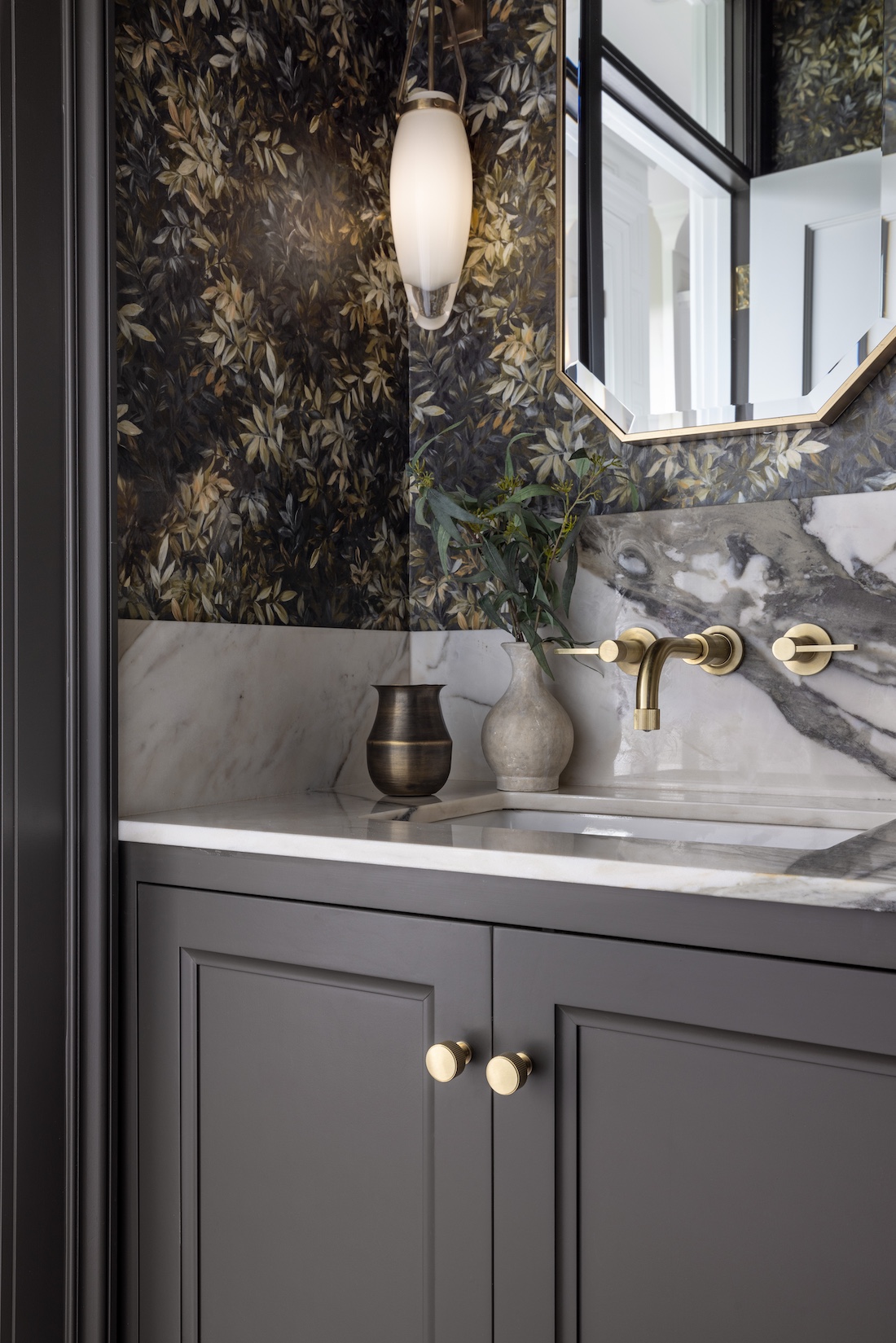 a kitchen with a sink a mirror and a window