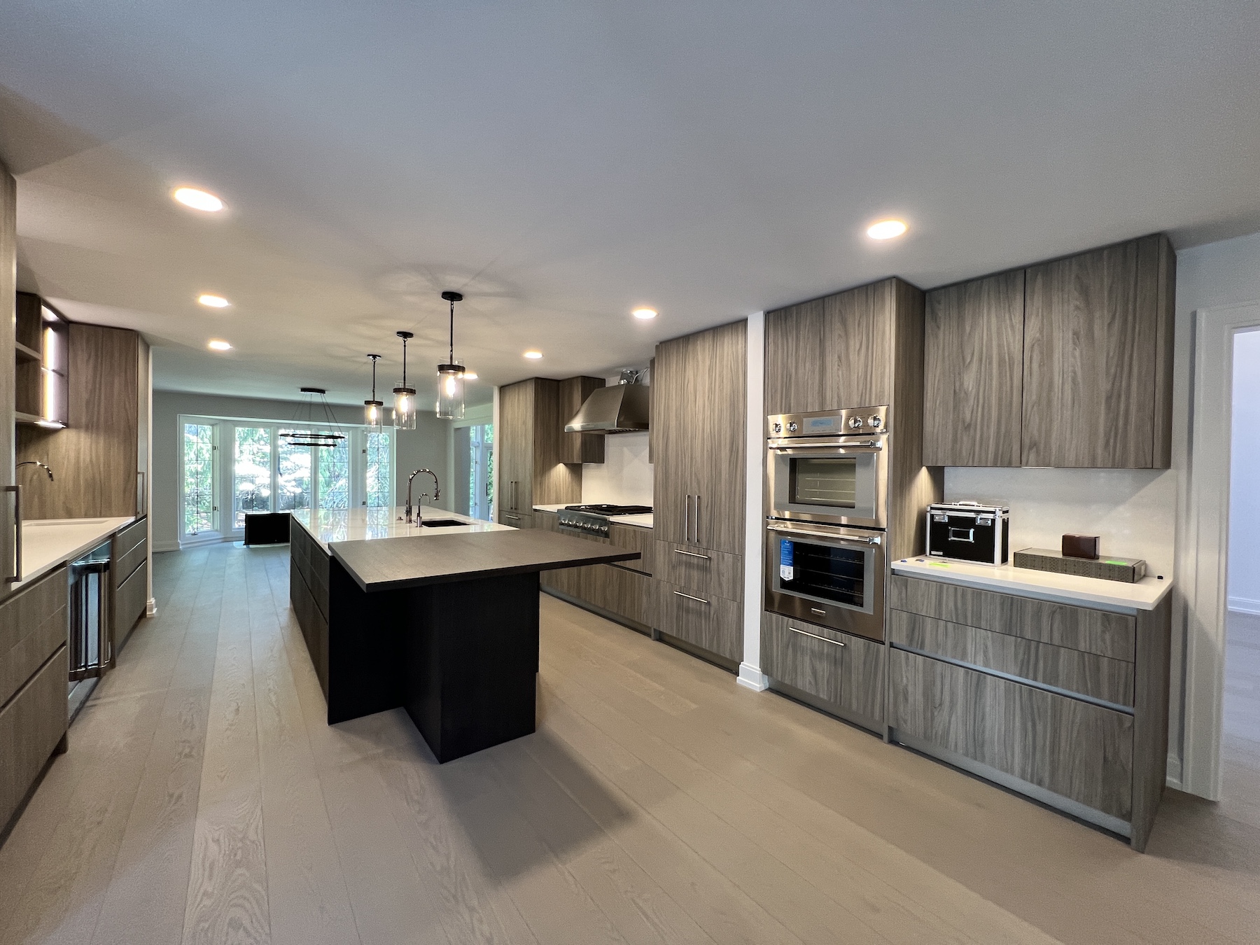 a modern kitchen with stainless steel appliances
