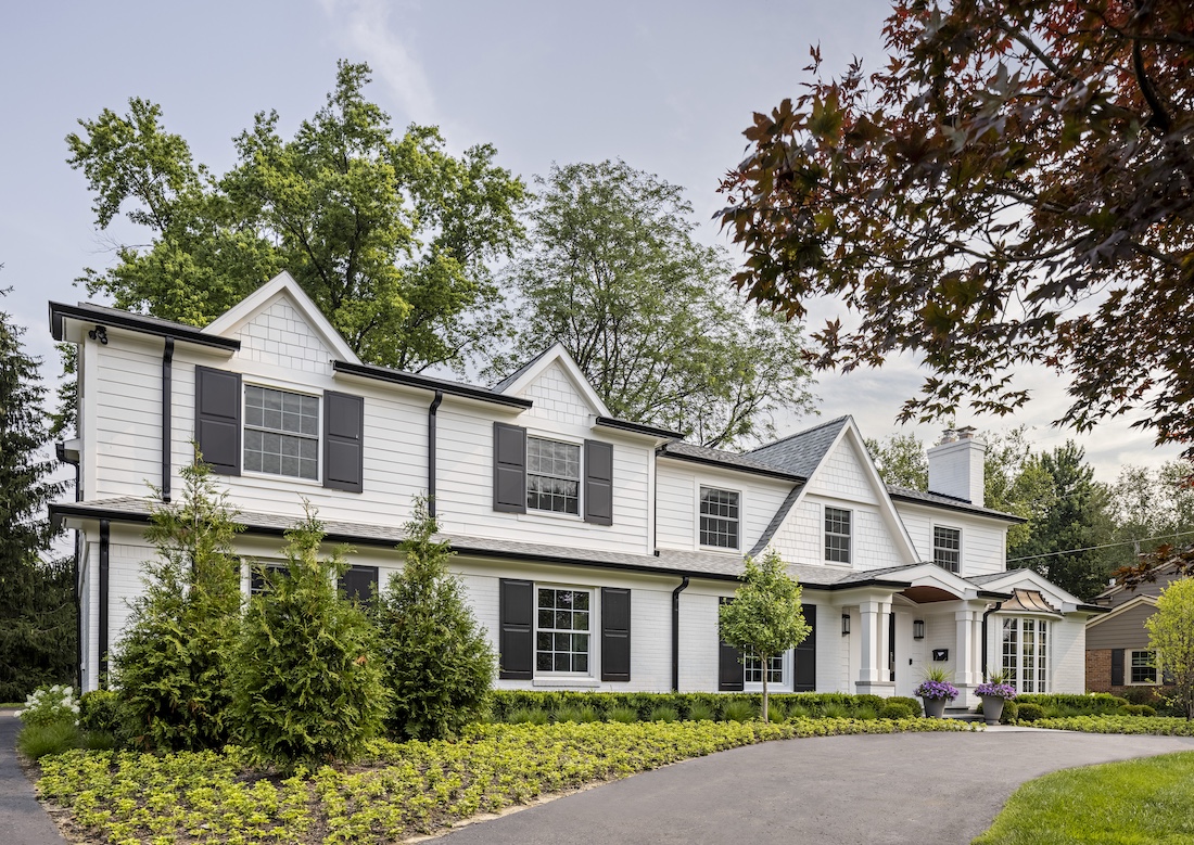 a house with trees in the background
