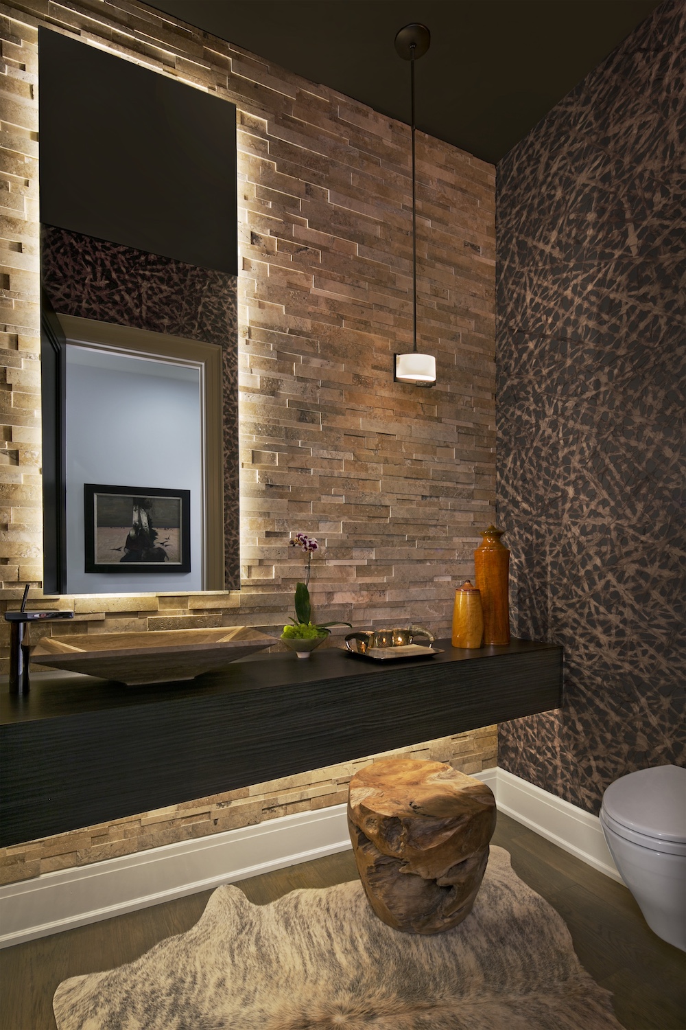 a bedroom with a fireplace and a large window