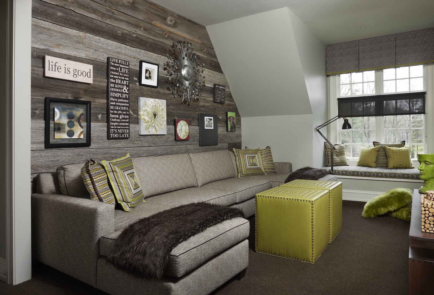 a living room filled with furniture and a large window